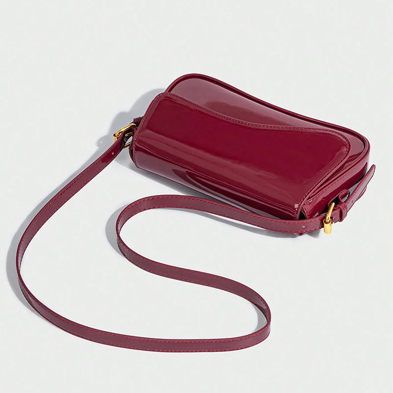 Classic crossbody bag with exquisite cherry pendant