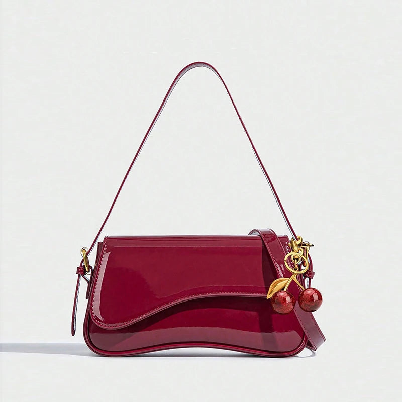 Classic crossbody bag with exquisite cherry pendant
